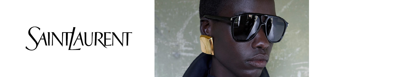 Une femme de profil portant des lunettes de soleil Saint Laurent et de forme ronde