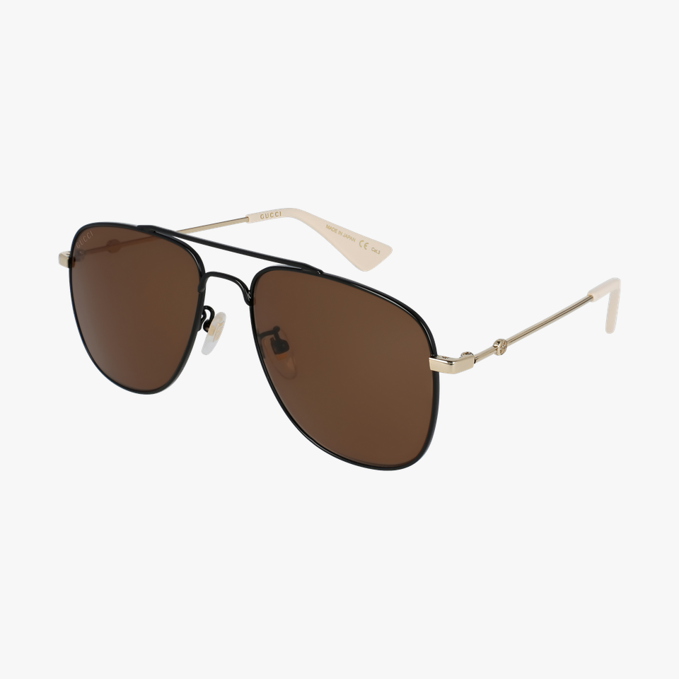 Lunettes de soleil homme GG0514S noir/dorée - Vue de 3/4