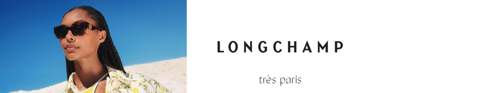 Photo d'une femme portant une lunettes de soleil Longchamp